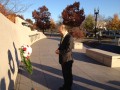 His Excellency Kenichiro Sasae, Ambassador of Japan, presents a floral wreath and pays his respects at the Wall of Heroes, which contains the names of over 800 Japanese Americans who died in line of duty during WW II.  Photo by John Tobe.