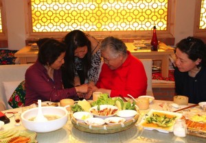 Lisa having dinner with Jian, grandma and aunt in China