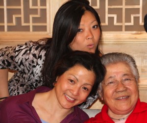 Lisa and Jian sharing a sweet moment with Grandma/Mom