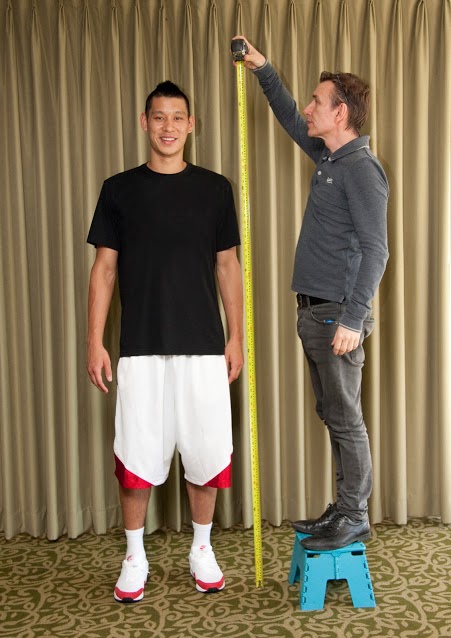 Jeremy Lin getting measured for his wax figure at Madame Tussauds 