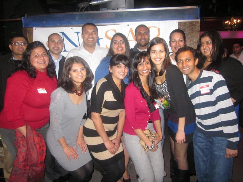 DC Group networking at a happy hour event. 