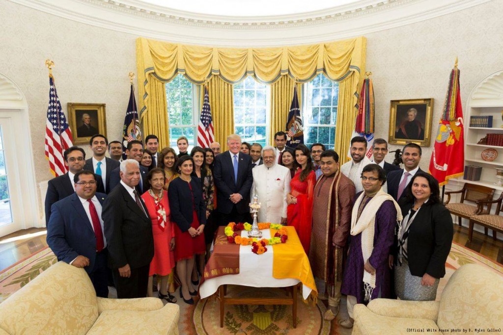 President Donald J. Trump poses in a group photo with US United Nations Ambassador Nikki Haley (left), following a Diwali ceremonial lighting of the Diya in the Oval Office at the White House, Tuesday, October 17, 2017, in Washington, DC.  Official White House photo by D. Myles Cullen