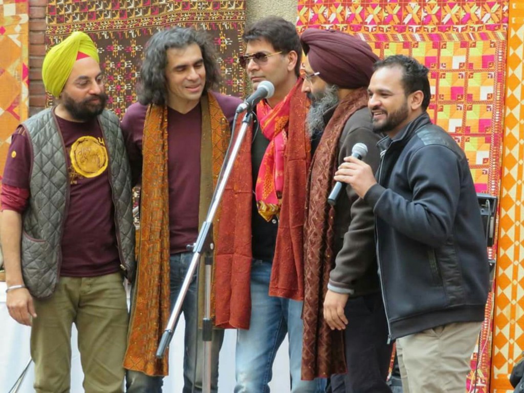 At the fifth annual Mela Phulkari are seen from left to right: organizer Harinder Singh, co-founder of retail chain 1469; film director Imtiaz Ali; Punjabi singer Jasbir Jassi; Sufi singer Rabbi Shergill; and co-emcee of the event RJ Jassi