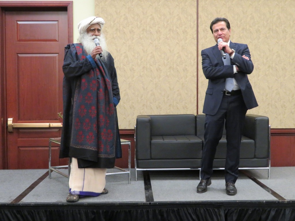 Dr. Mukesh Aghi (right), president and CEO of US-India Strategic Partnership Forum (USISPF), moderating a talk by Indian mystic and visionary Sadhguru, on Capitol Hill