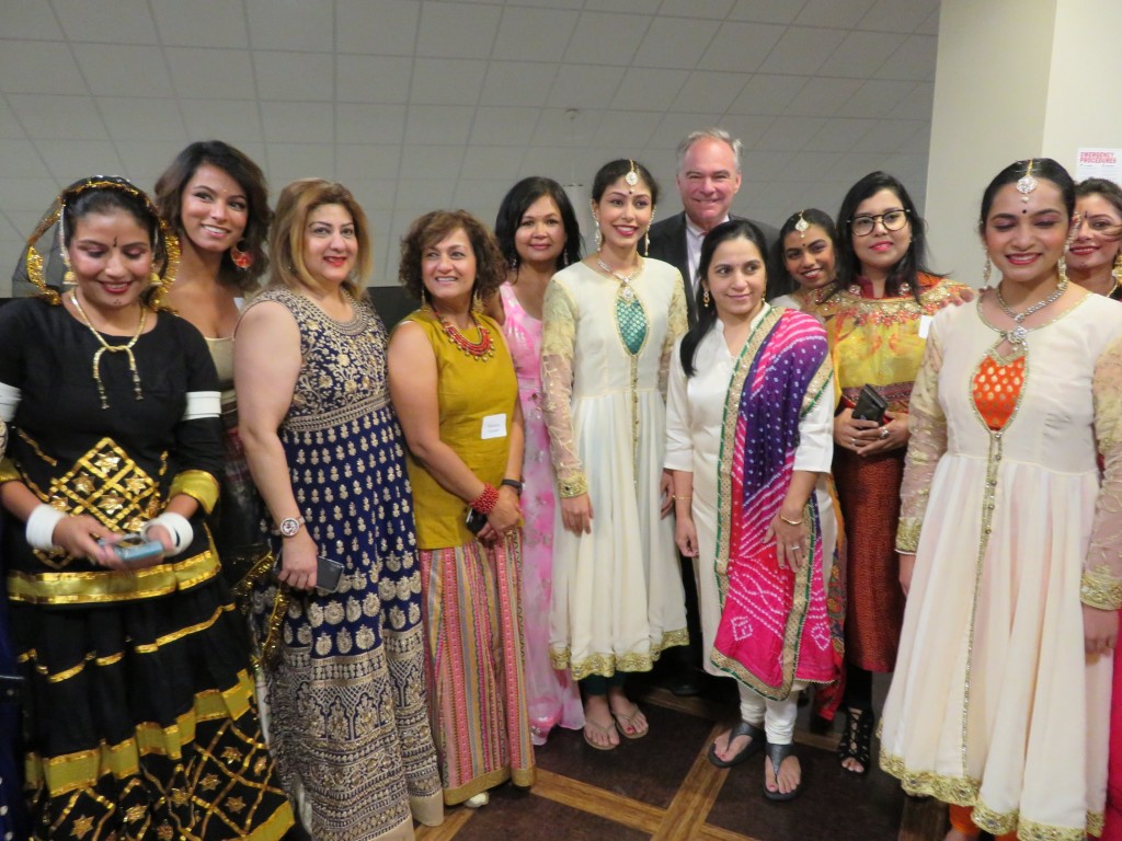 Democratic Senator Tim Kaine of Virginia is flanked by guests and performers at a 'Diwali' celebration co-hosted by Democratic Asian Americans of Virginia (DAAV) and Virginia's 11th Congressional District Democratic Committee (CDDC). The event was held October 13, 2018, at the Ernst Community Cultural Center in Annandale