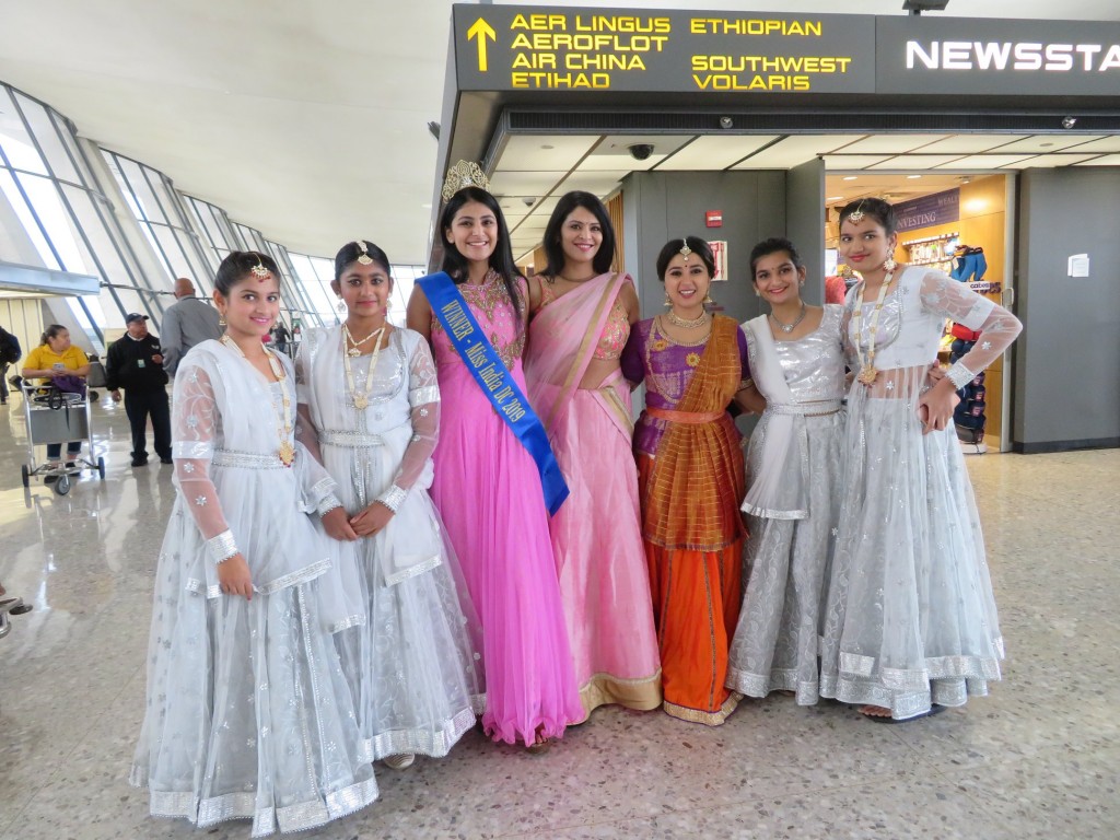 Shweta Misra, founder and director of Sterling-based Nrityaki Dance Academy, is flanked by her students at the first-ever celebration of Diwali at Washington Dulles International Airport