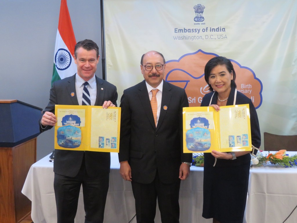 Indian Ambassador Harsh Vardhan Shringla (center) presented commemorative postage stamps released by the Government of India on the momentous occasion of the 550th birth anniversary of Guru Nanak Dev, founder of Sikhism, to Senator Todd Young (left) and Congresswoman Judy Chu at a celebratory event held in the Hart Senate Office Building on Capitol Hill